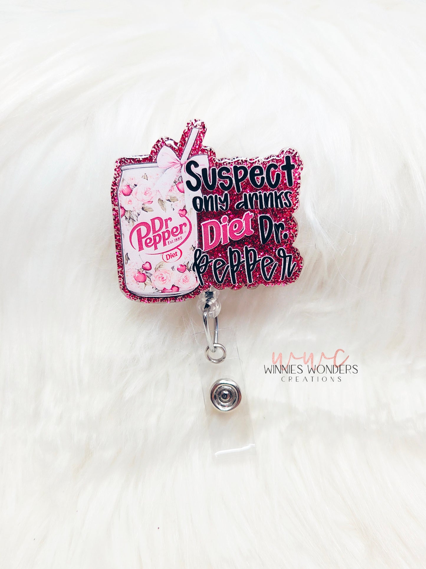 Suspect only drinks diet DP Badge Reel