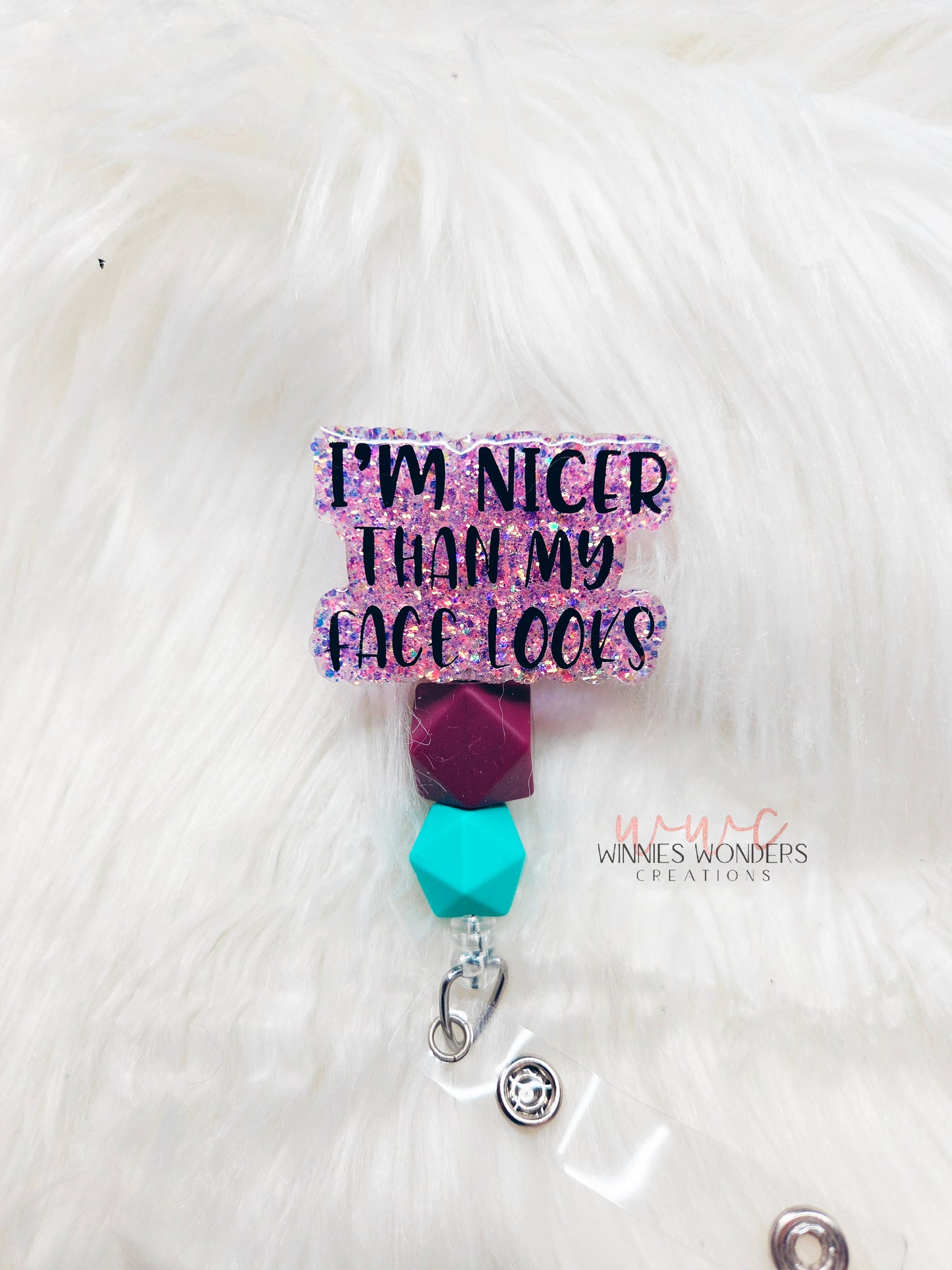 Nicer than my face looks Badge Reel