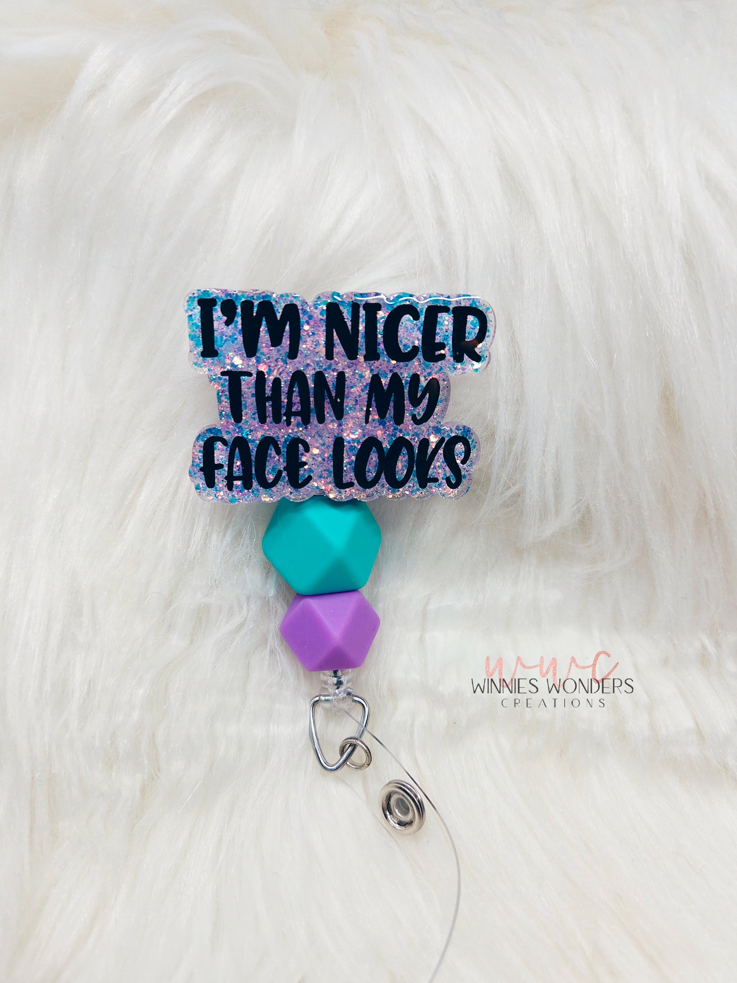 Nicer than my face looks Badge Reel