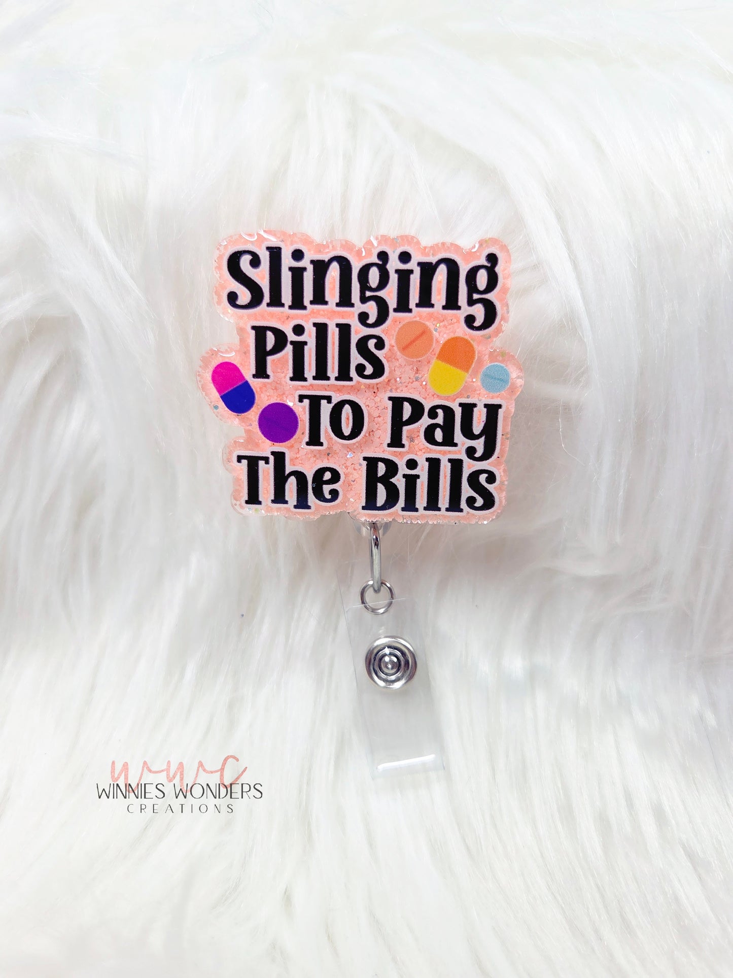 Slinging Pills Badge Reel