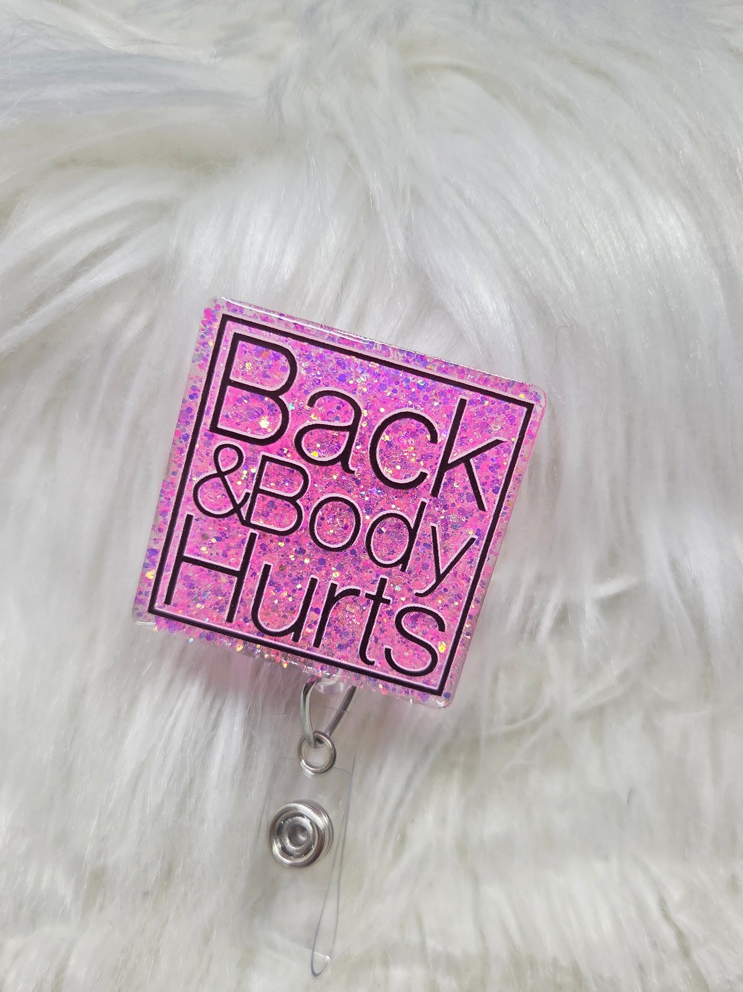 Back and Body Hurts Badge Reel