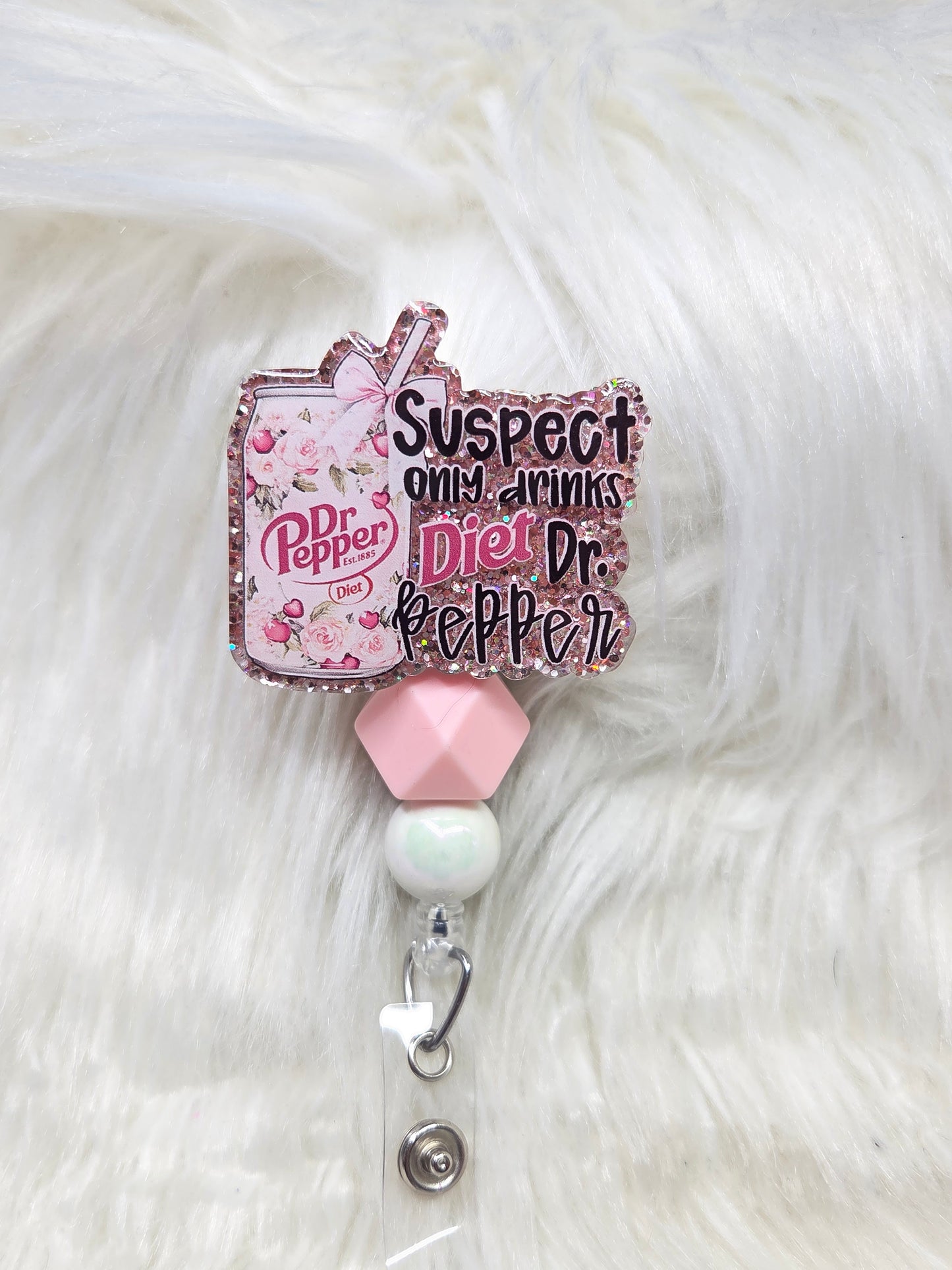 Suspect only drinks diet DP Badge Reel