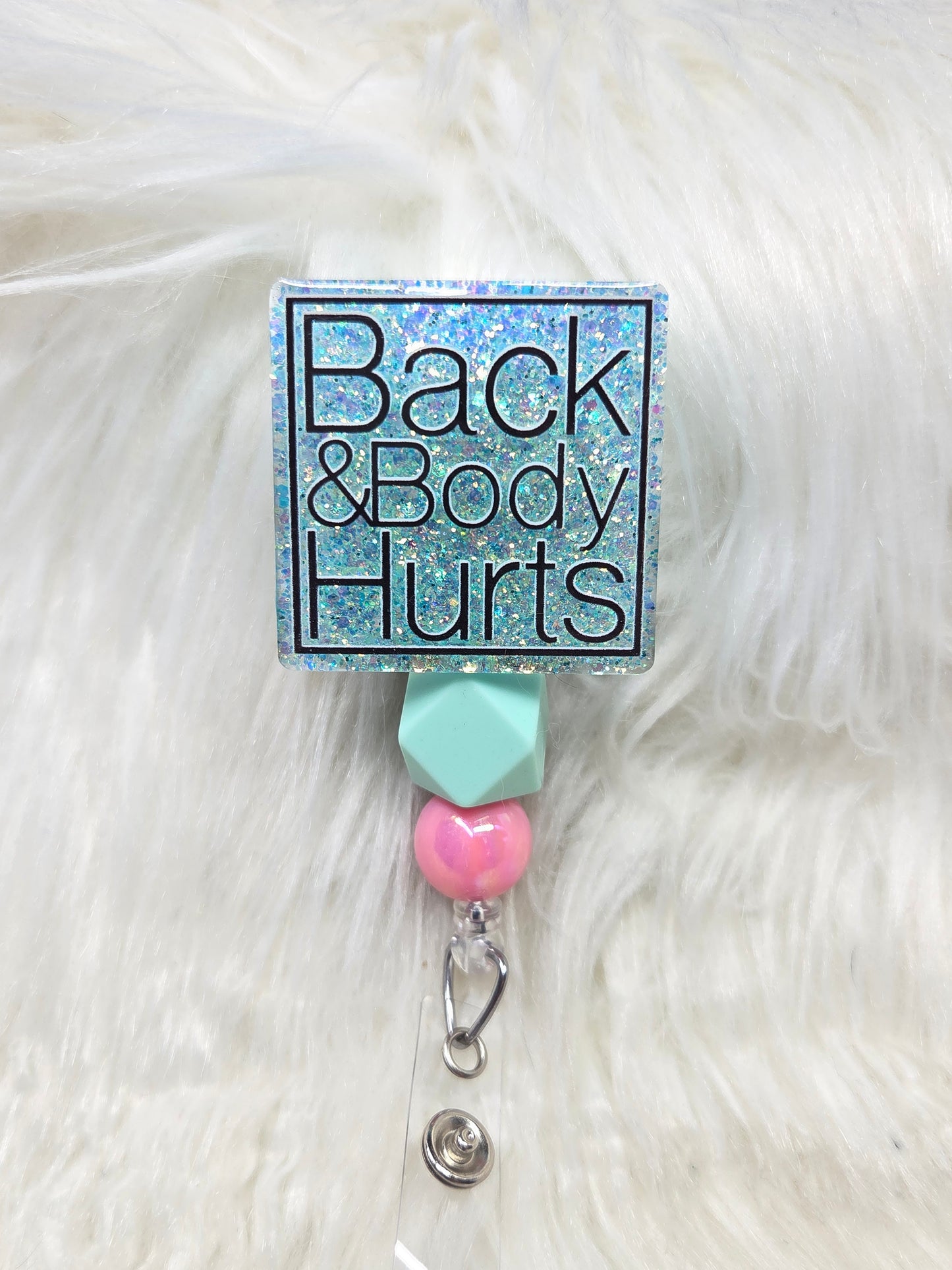 Back and Body Hurts Badge Reel