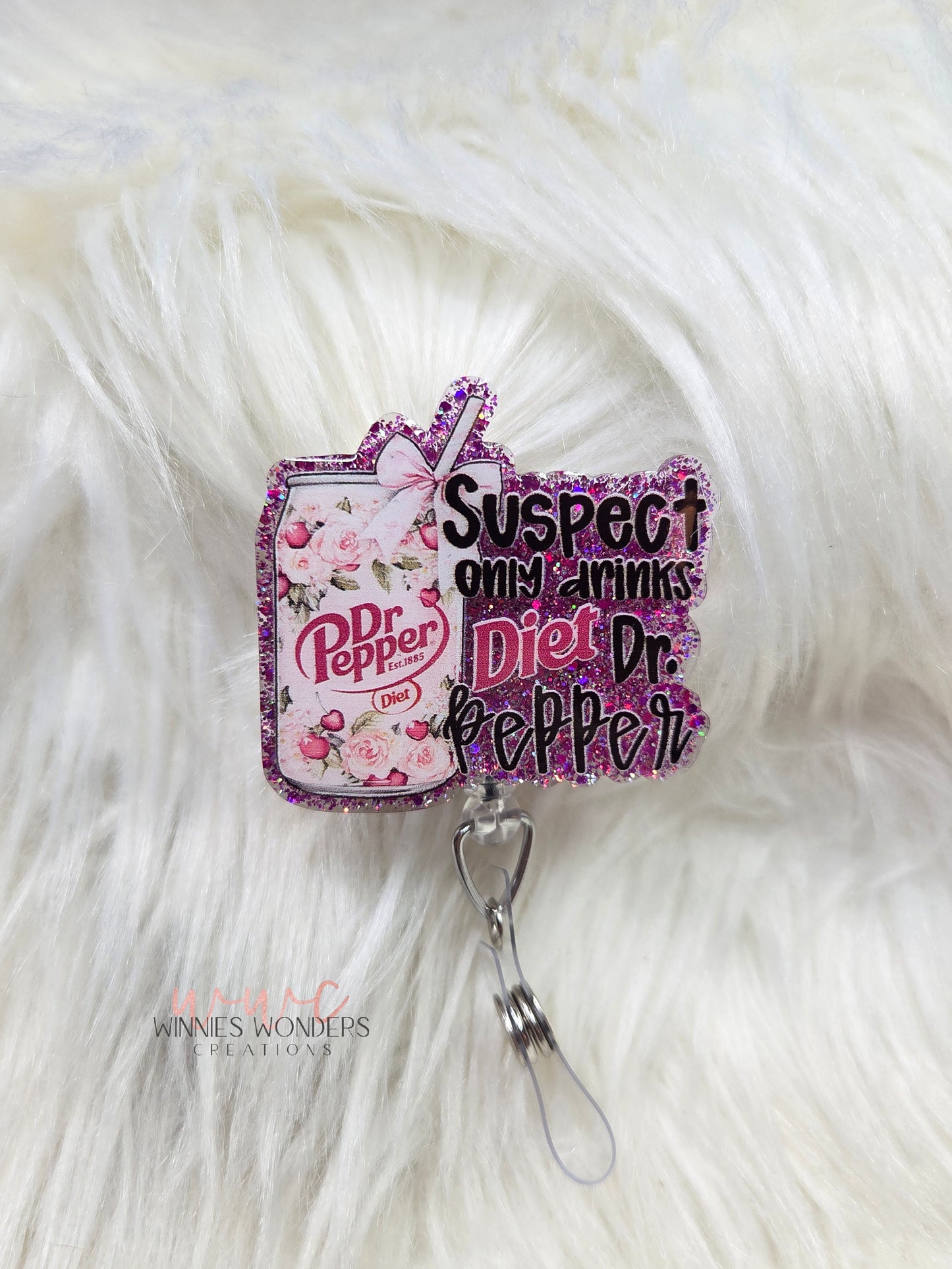 Suspect only drinks diet DP Badge Reel