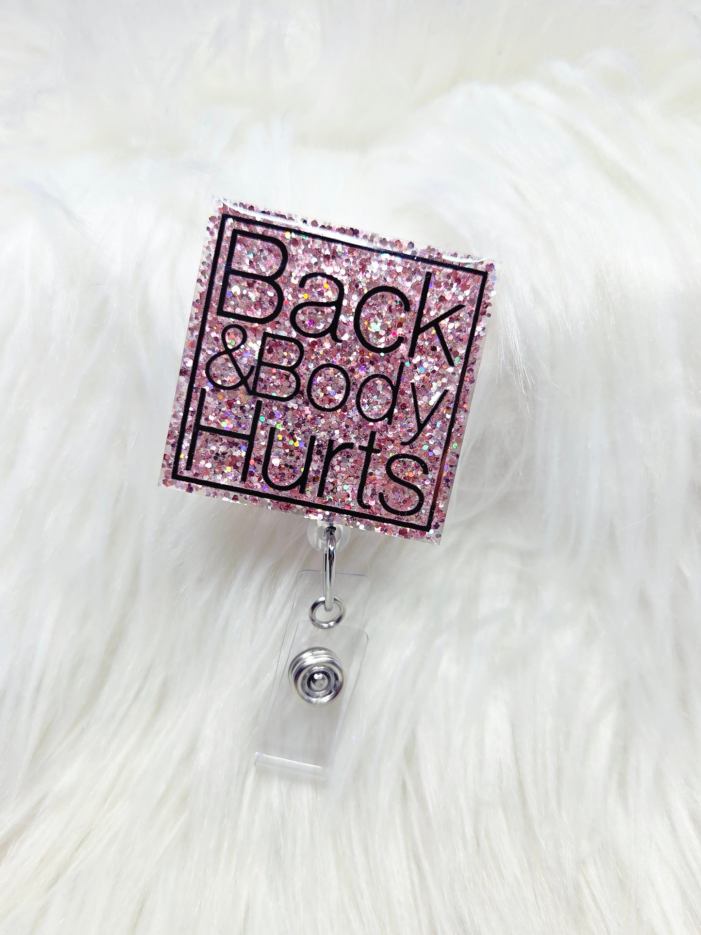 Back and Body Hurts Badge Reel