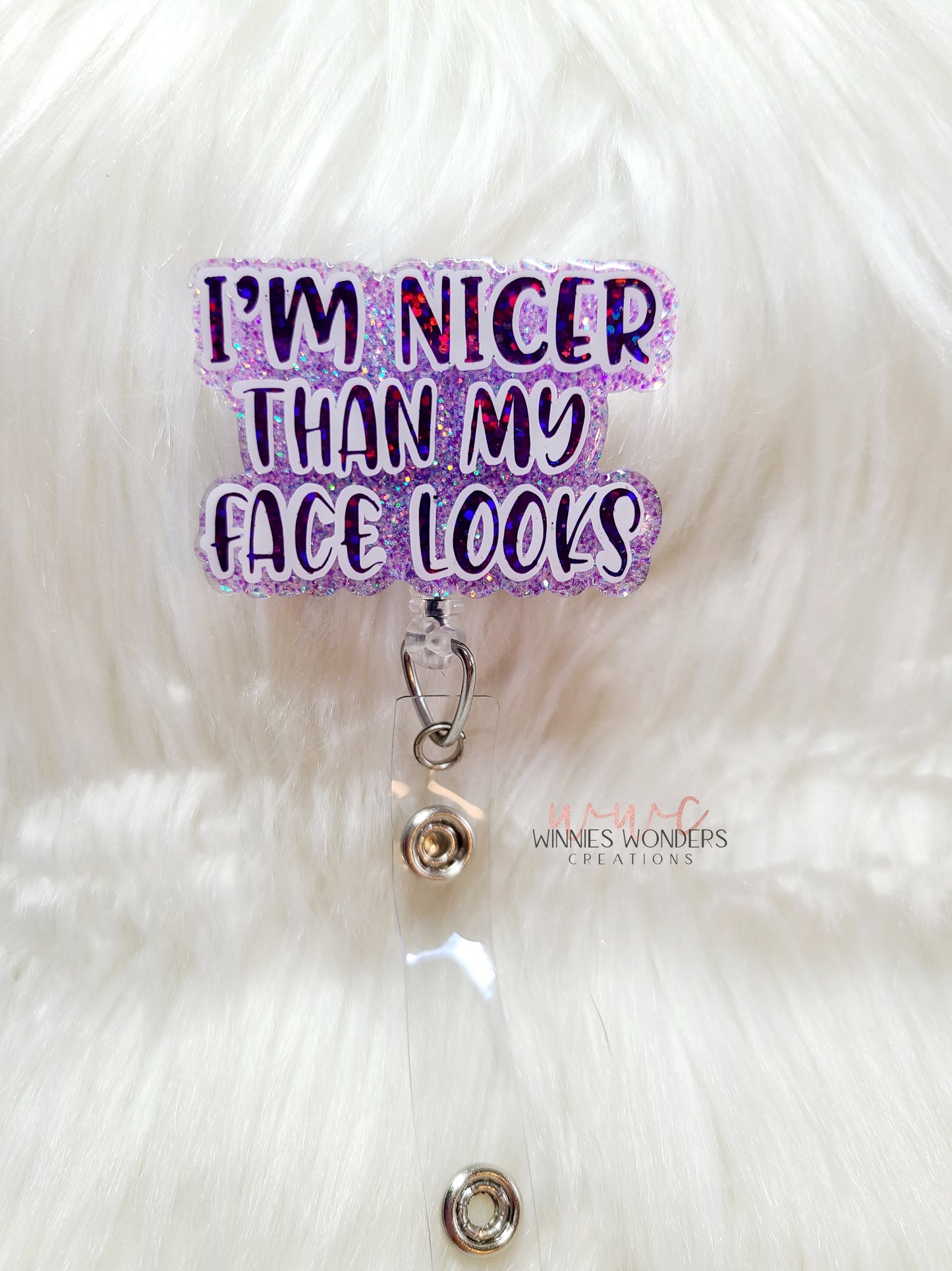 Nicer than my face looks Badge Reel