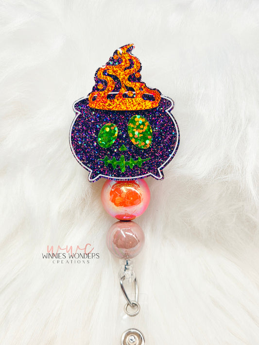 Smokey Cauldron Badge Reel