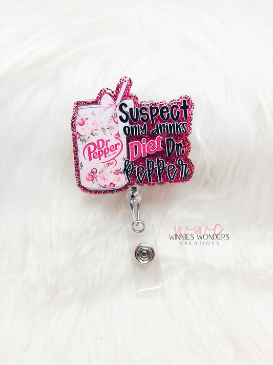 Suspect only drinks diet DP Badge Reel