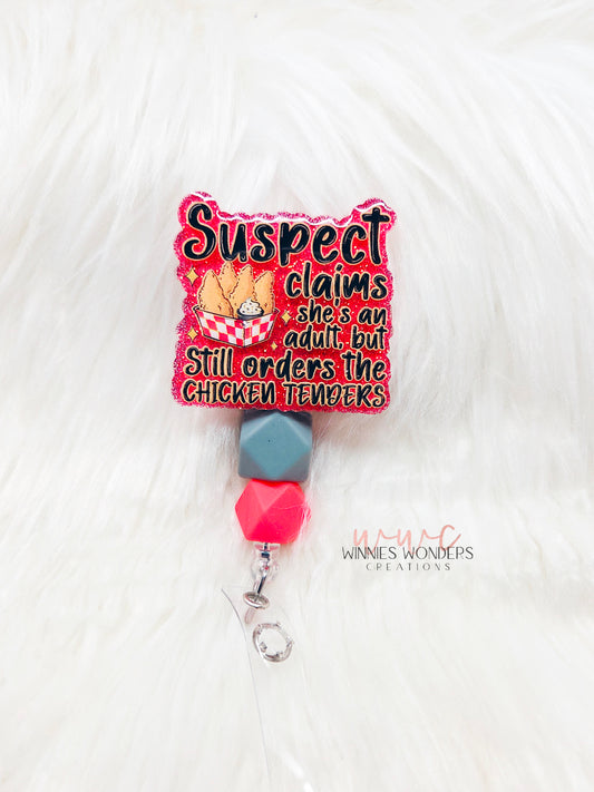 Suspect Adult Chicken Tenders Badge Reel
