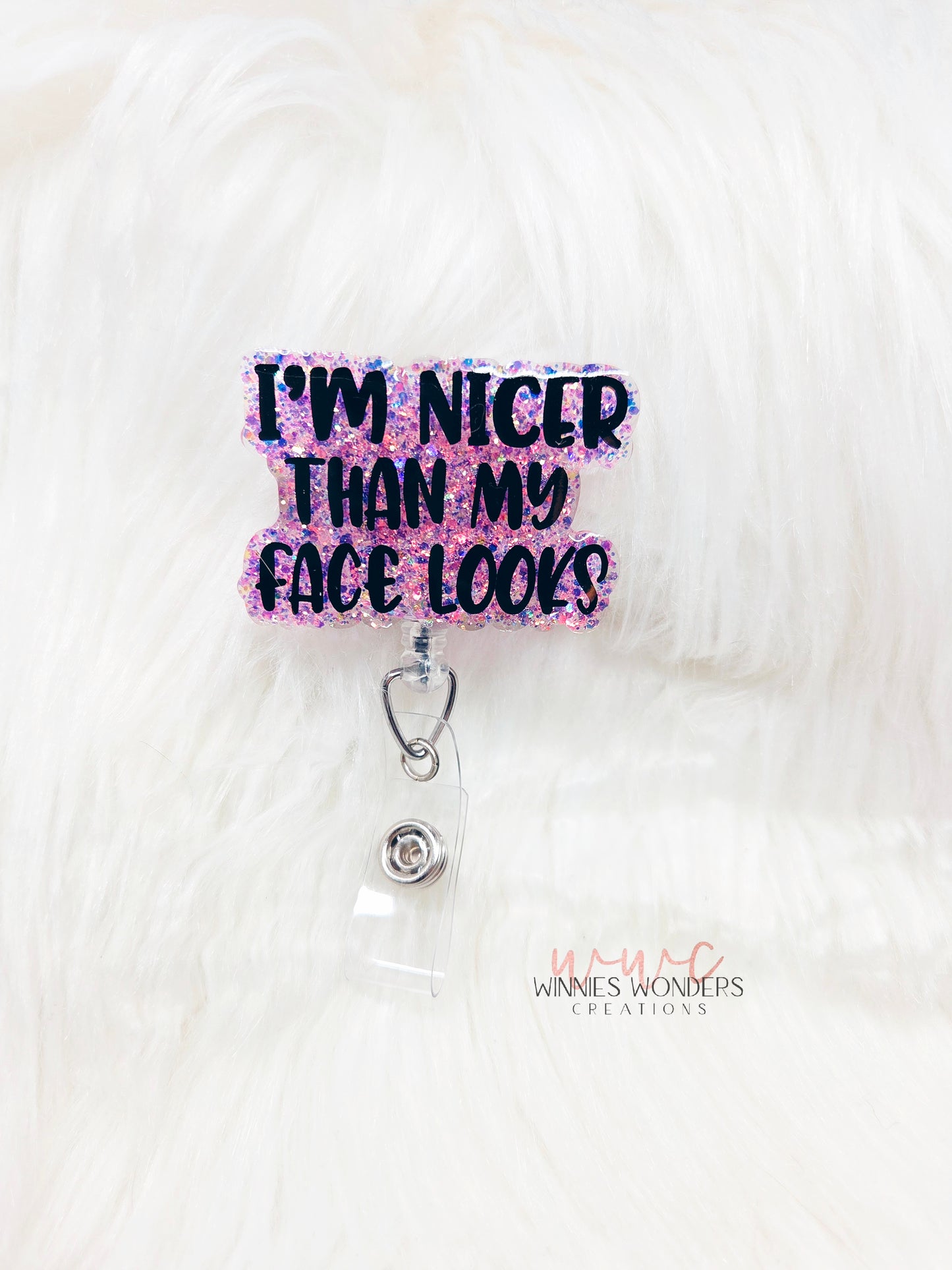 Nicer than my face looks Badge Reel