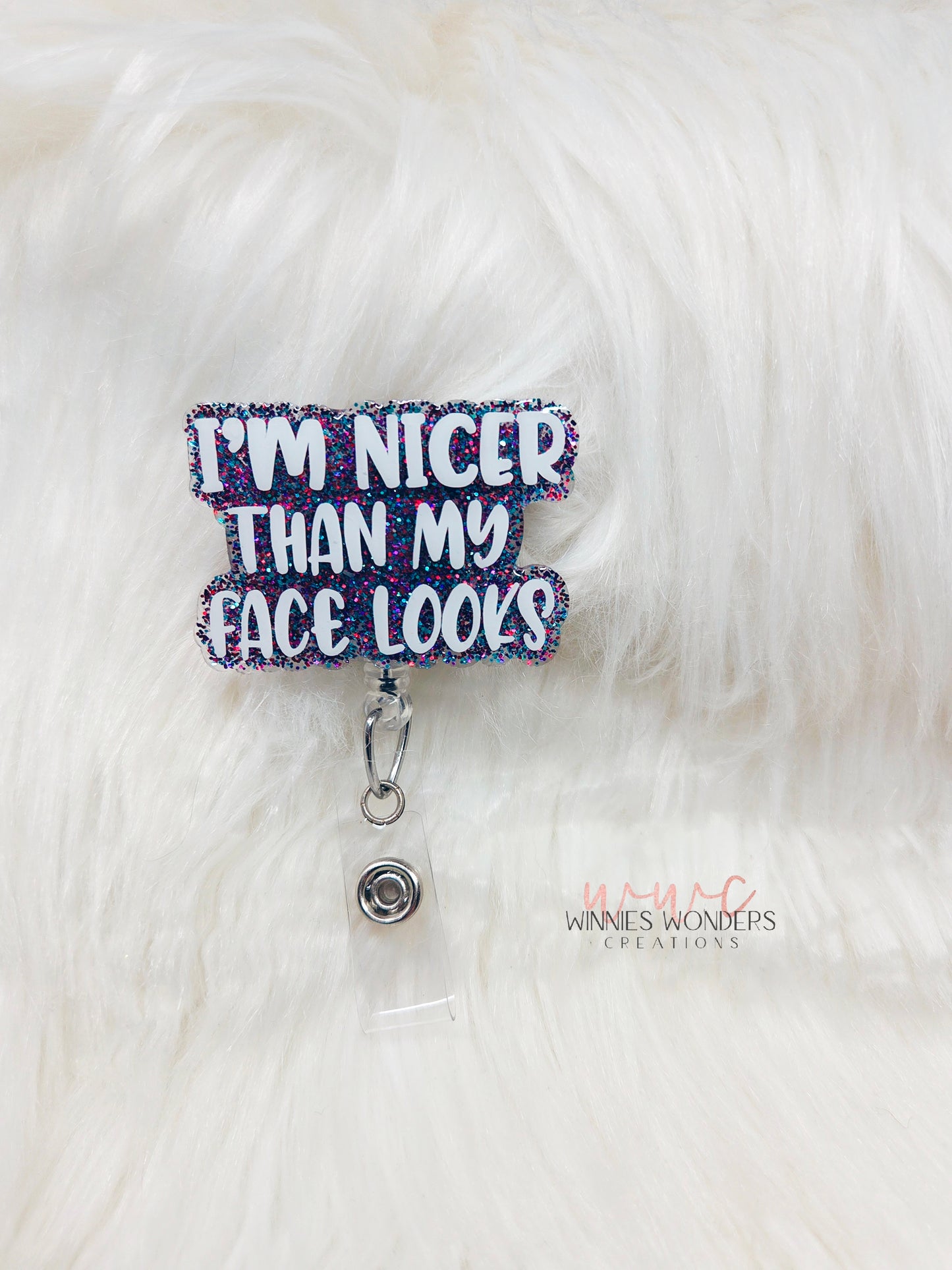 Nicer than my face looks Badge Reel