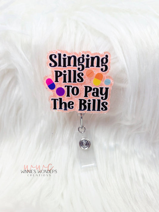 Slinging Pills Badge Reel