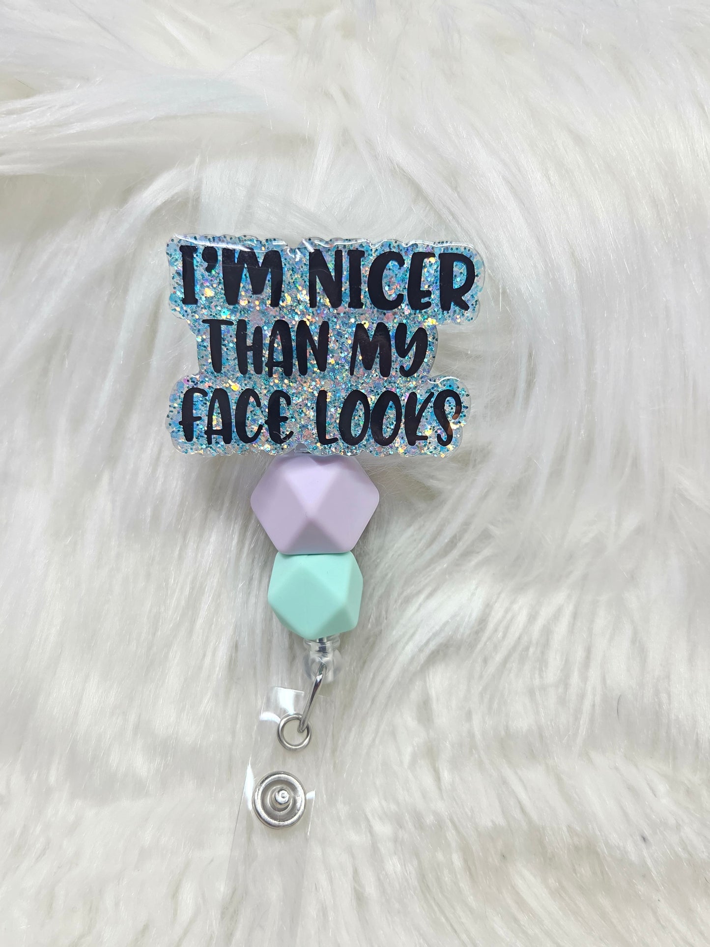Nicer than my face looks Badge Reel