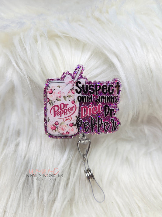 Suspect only drinks diet DP Badge Reel