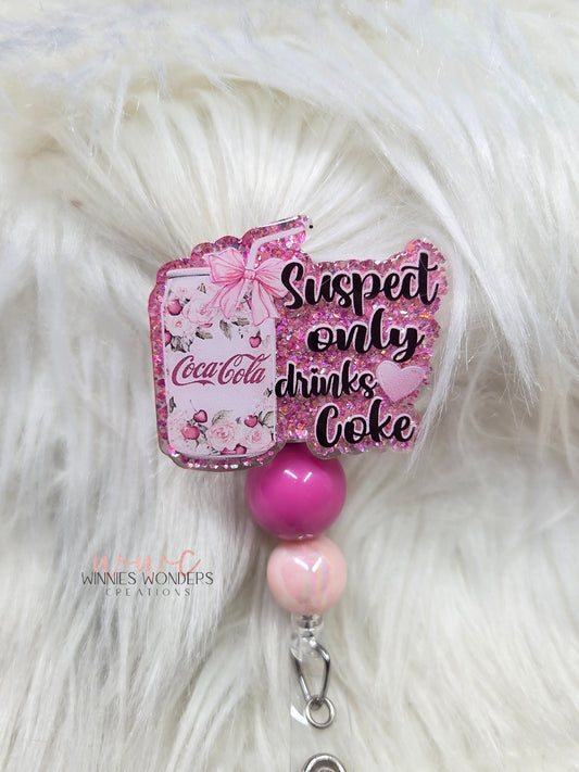 Suspect only drinks Coke Badge Reel