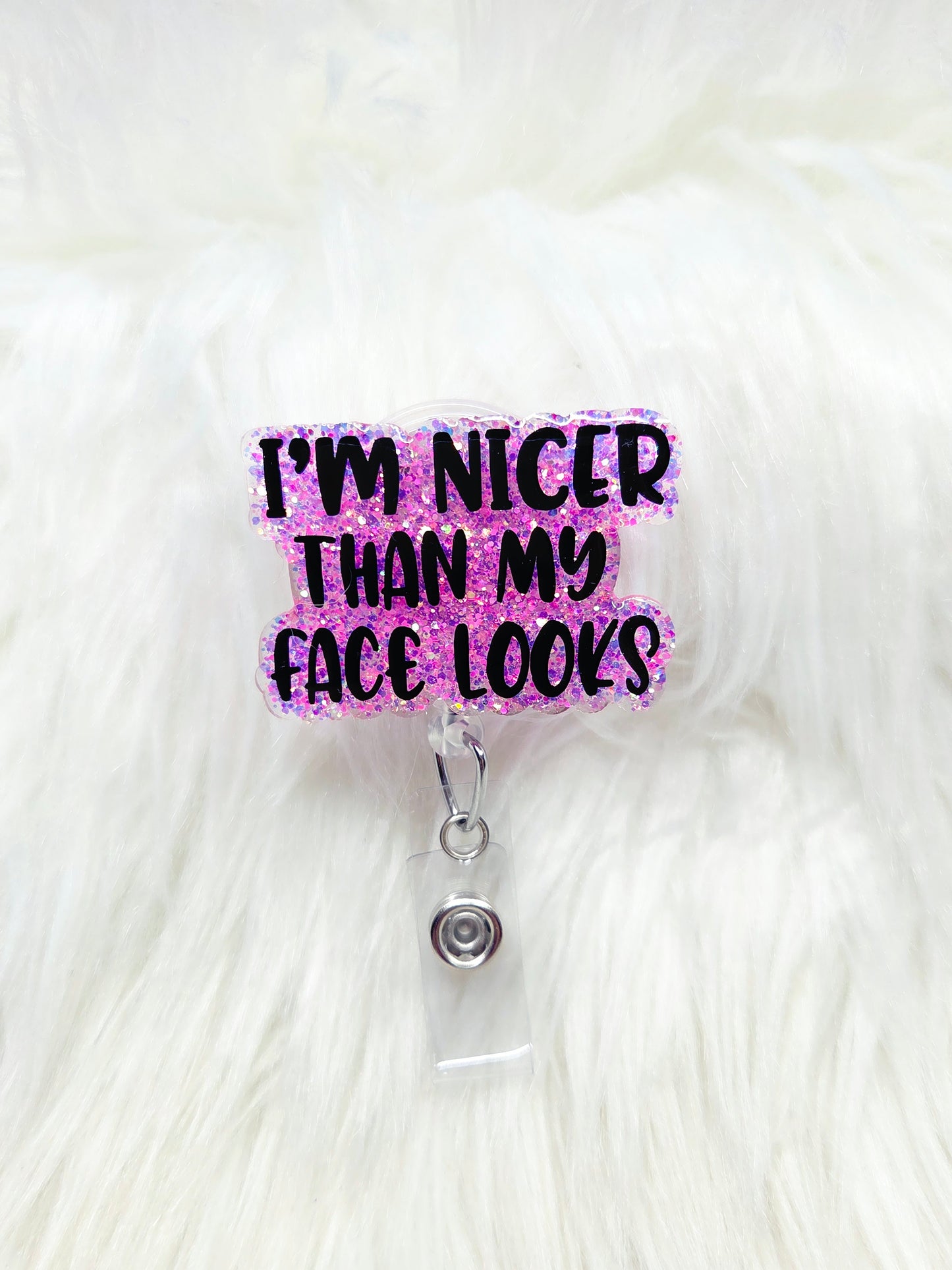 Nicer than my face looks Badge Reel