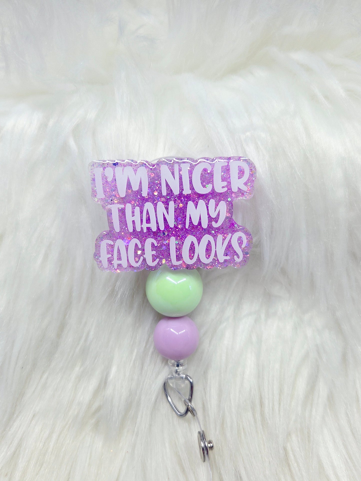 Nicer than my face looks Badge Reel