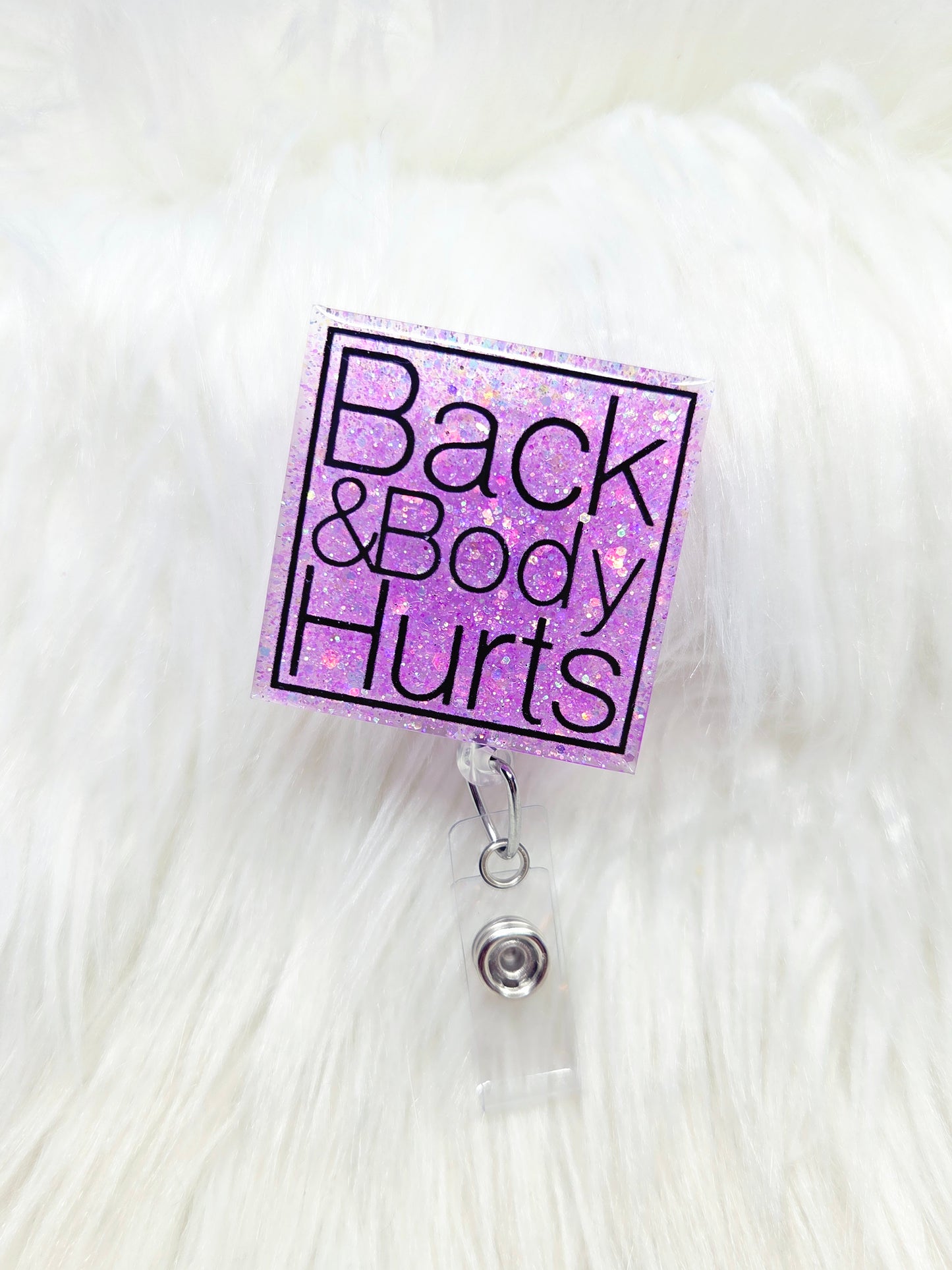 Back and Body Hurts Badge Reel