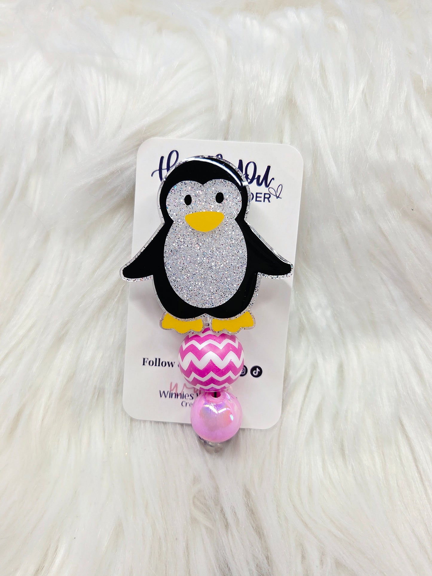 Penguin Badge Reel