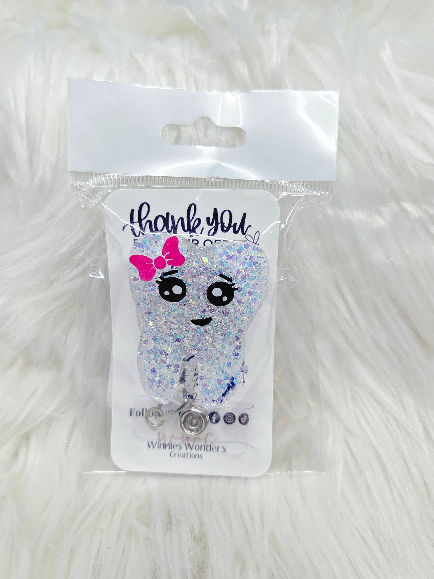 Tooth Badge Reel