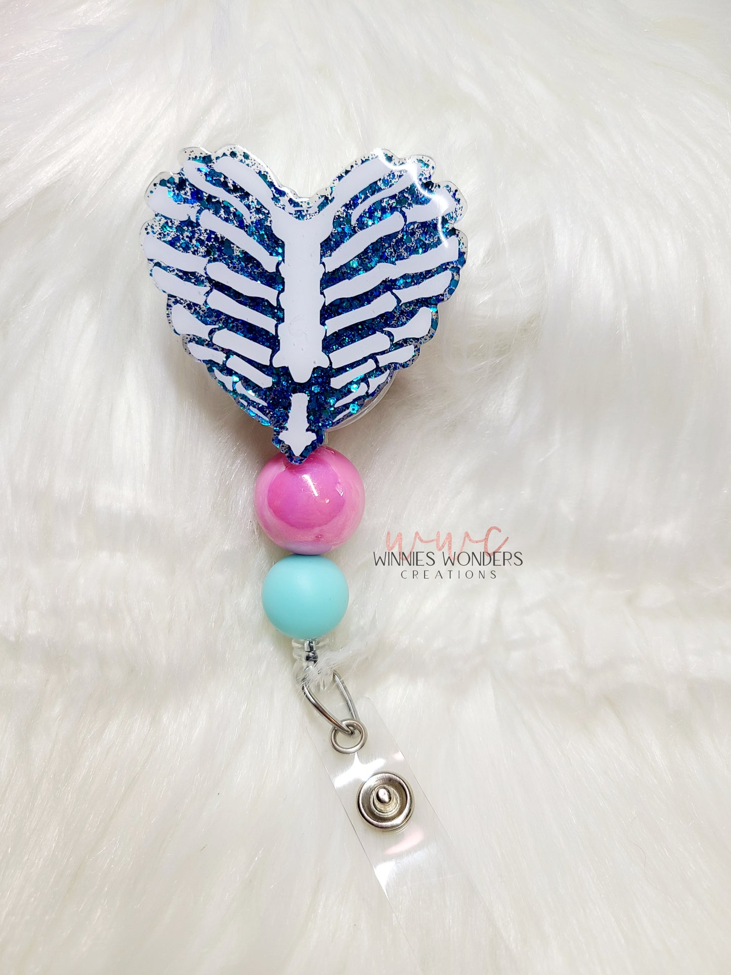 Rib Cage Heart Badge Reel