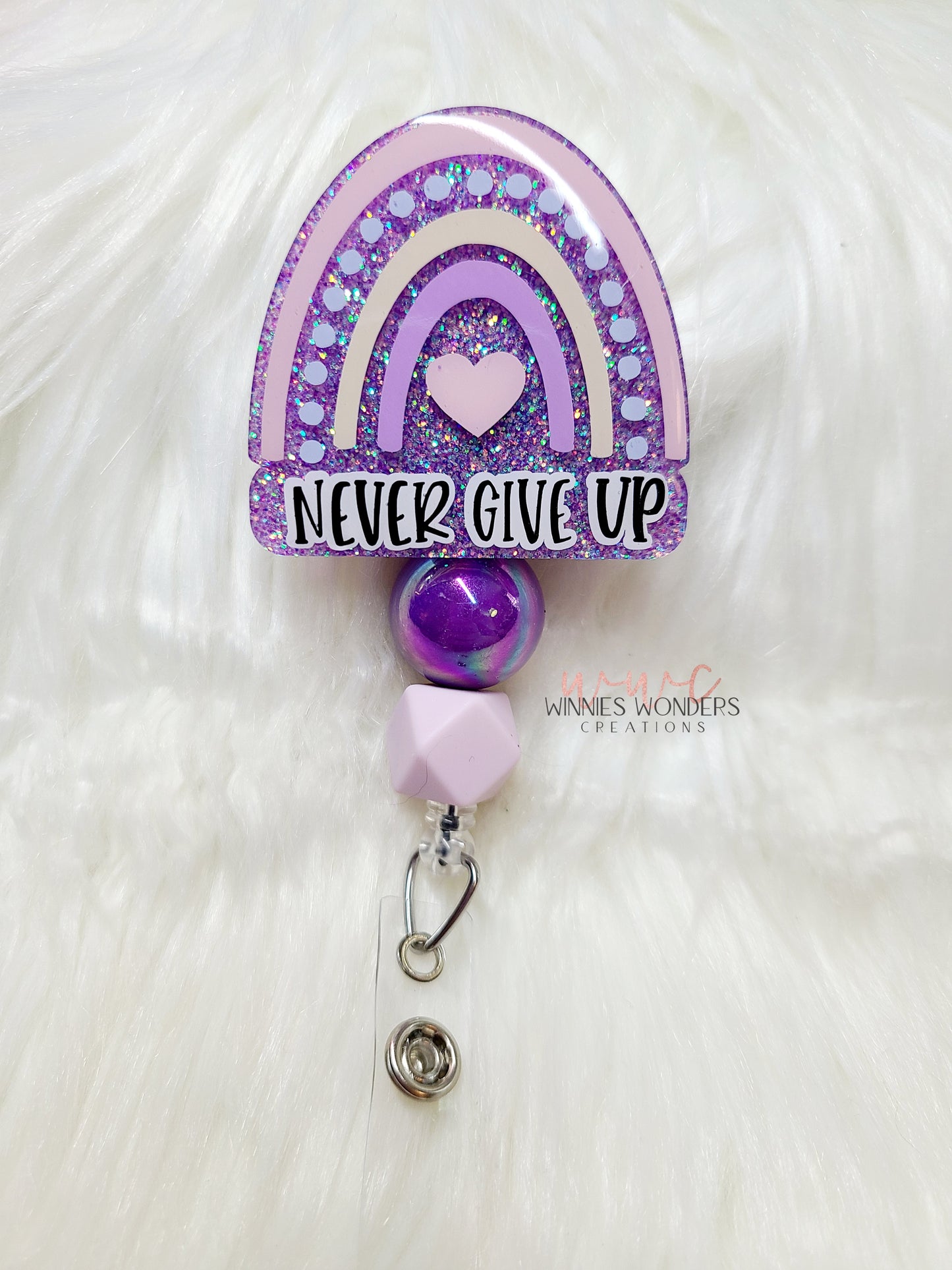 Never Give Up Rainbow Badge Reel