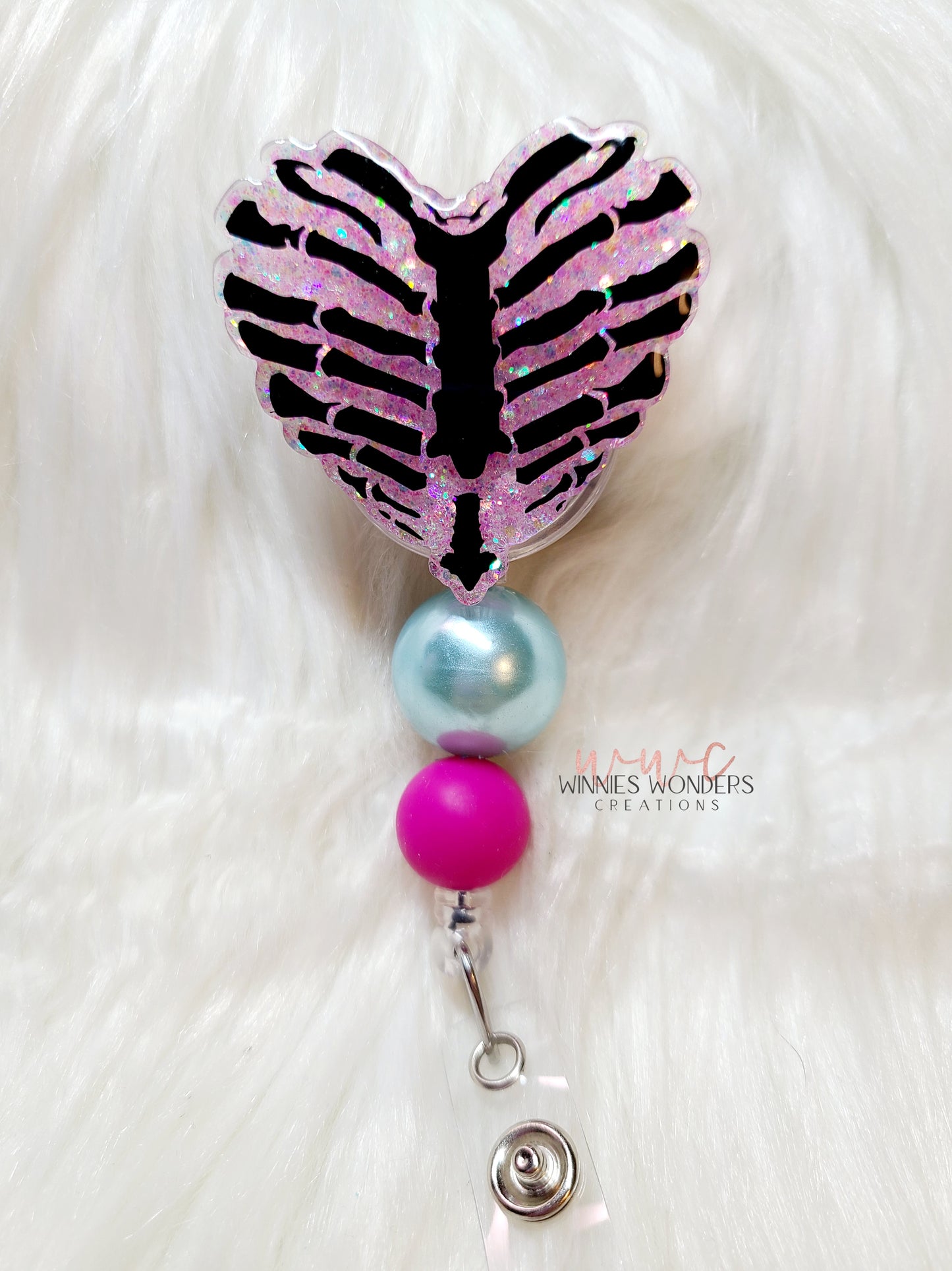 Rib Cage Heart Badge Reel