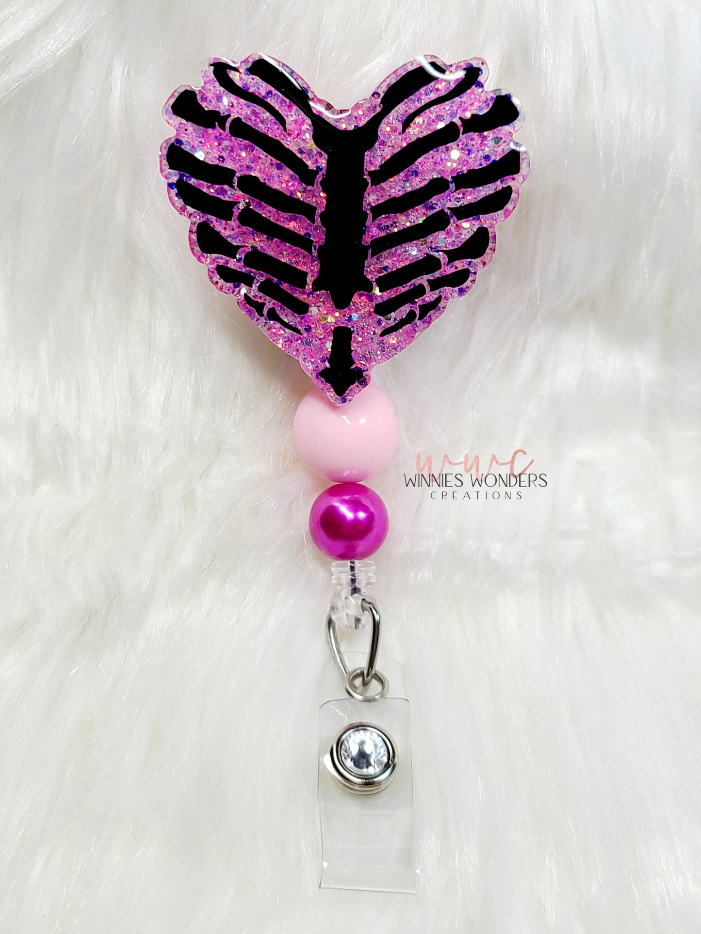 Rib Cage Heart Badge Reel