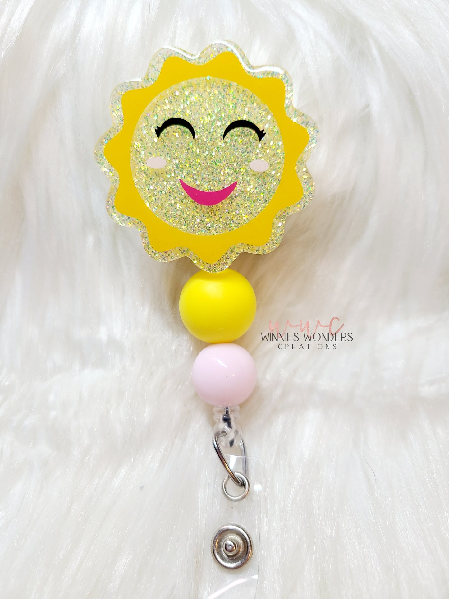 Sun Badge Reel