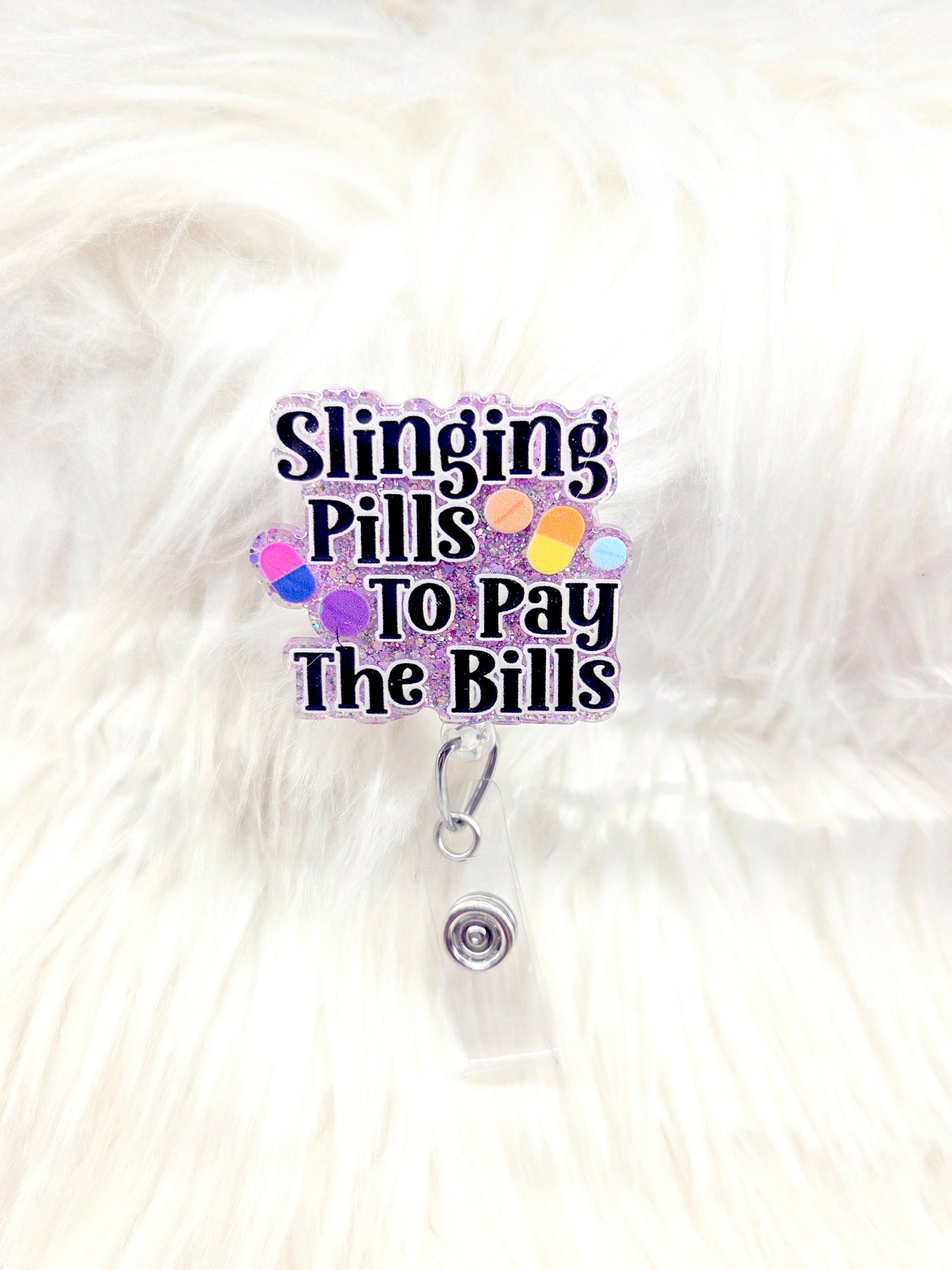 Slinging Pills Badge Reel