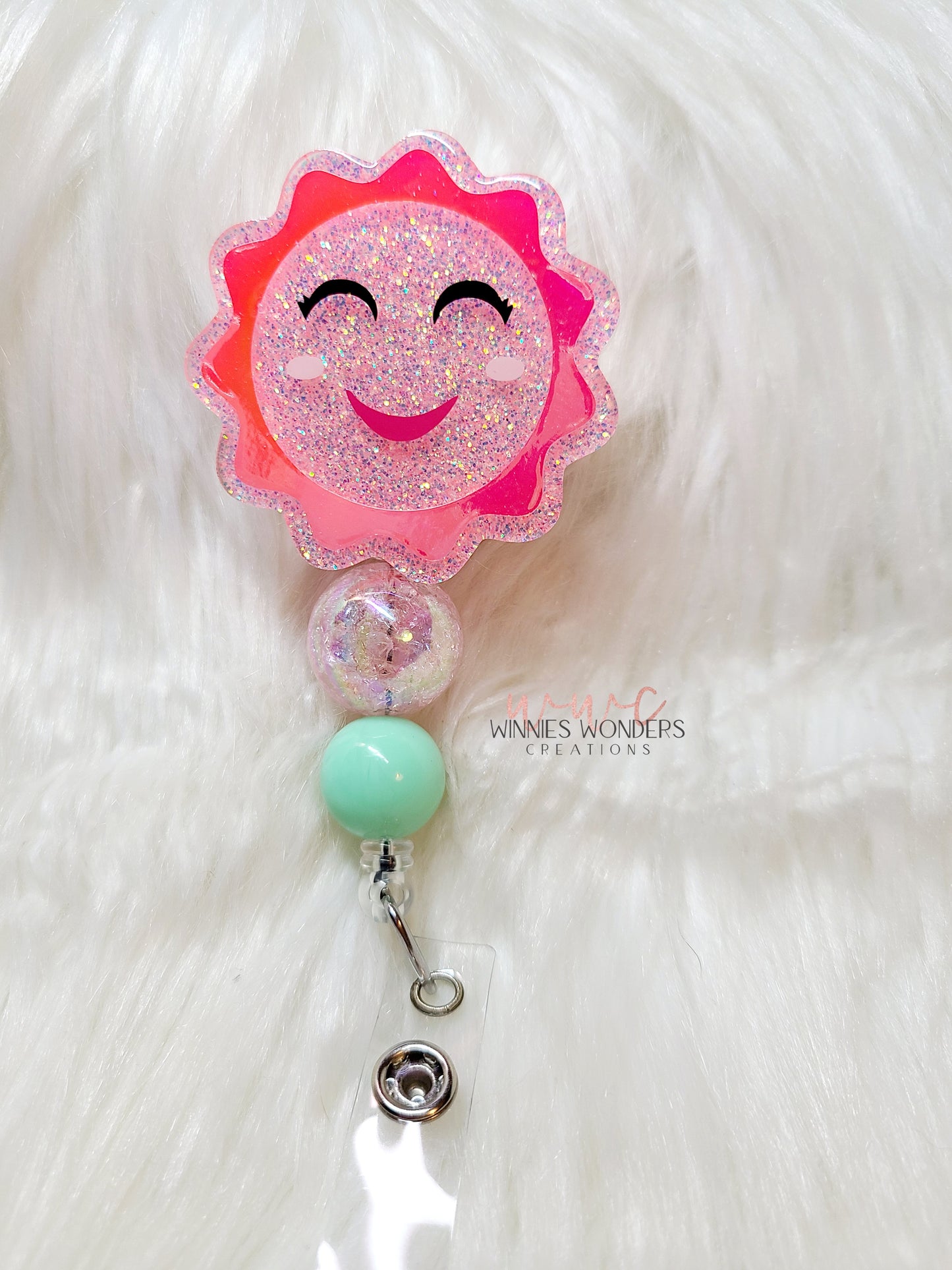 Sun Badge Reel